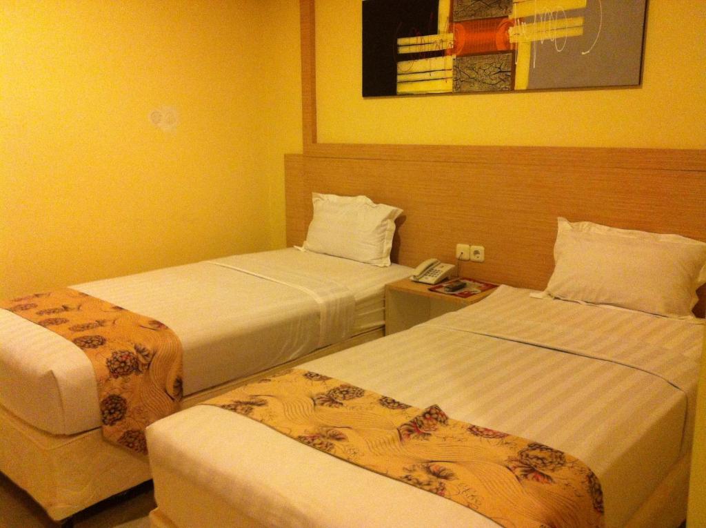 Hotel Paramount Biringkanya Rum bild