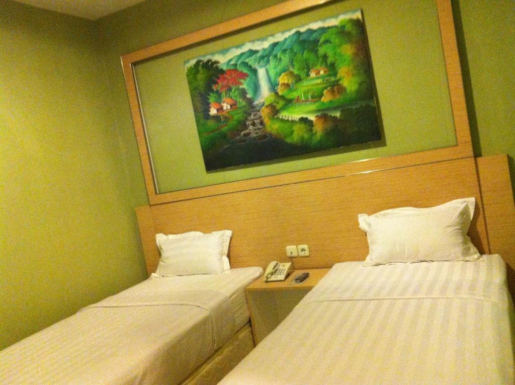 Hotel Paramount Biringkanya Rum bild